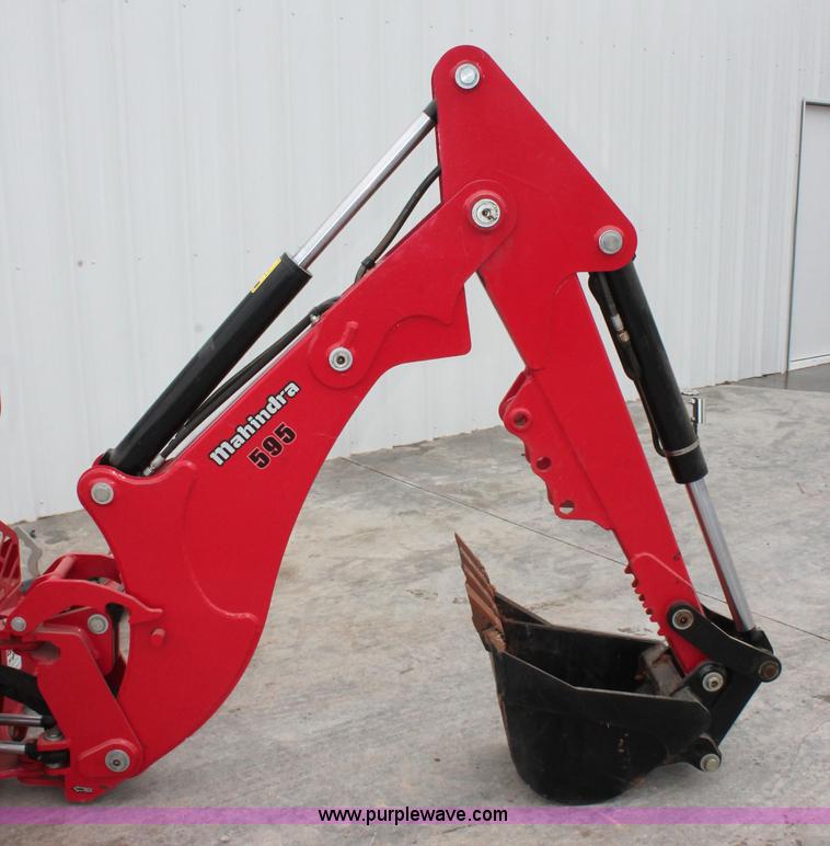 Mahindra 595 backhoe attachment in Norman, OK Item H5815 sold Purple Wave