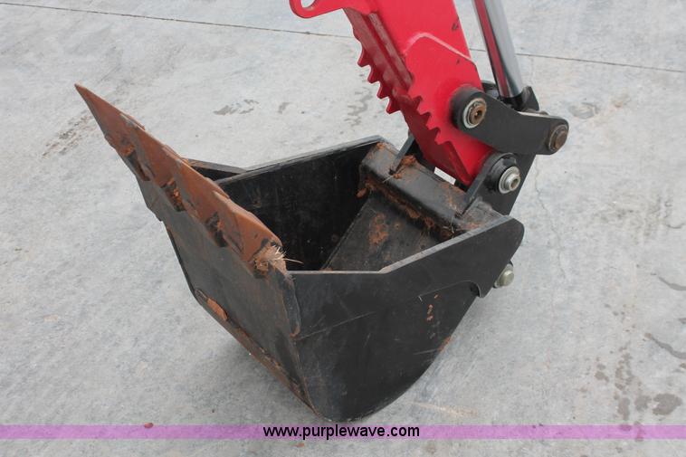 image for item H5815 Mahindra 595 backhoe attachment
