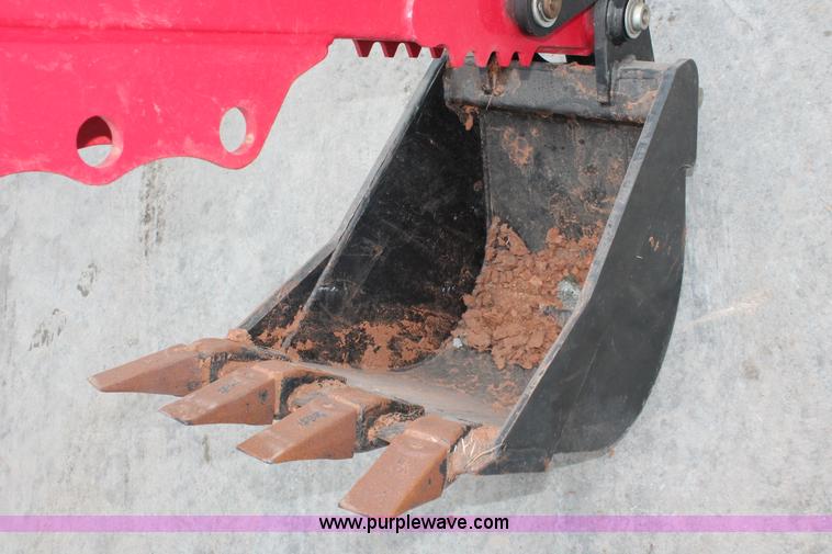 image for item H5815 Mahindra 595 backhoe attachment
