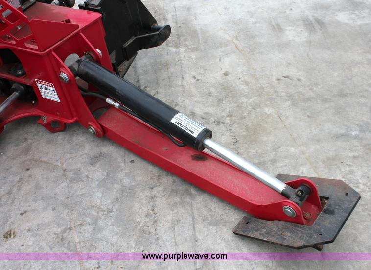image for item H5815 Mahindra 595 backhoe attachment