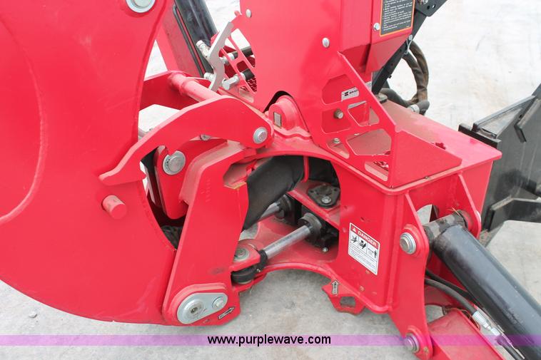 image for item H5815 Mahindra 595 backhoe attachment