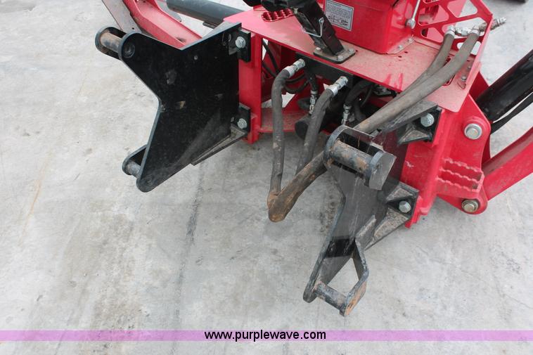 image for item H5815 Mahindra 595 backhoe attachment