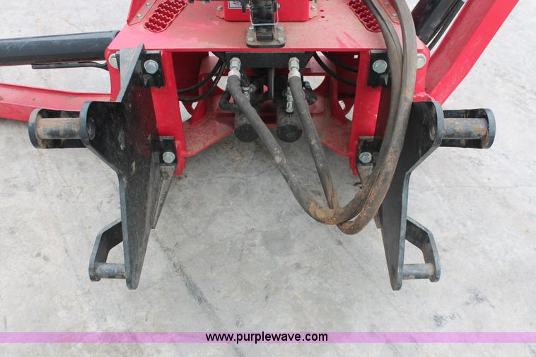image for item H5815 Mahindra 595 backhoe attachment