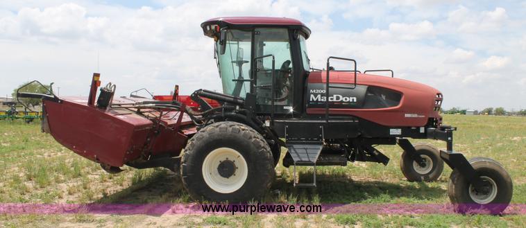 image for item H1506 2008 MacDon M200 self-propelled windrower