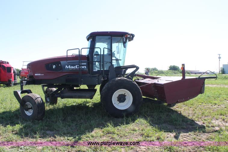 image for item H1506 2008 MacDon M200 self-propelled windrower