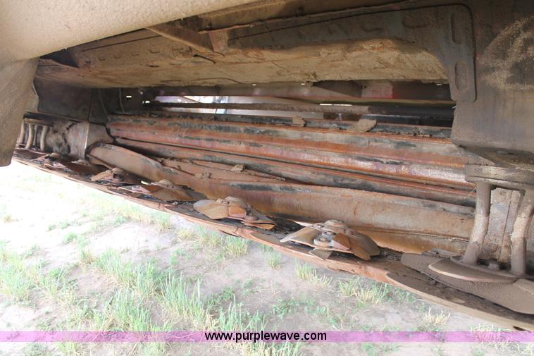 image for item H1506 2008 MacDon M200 self-propelled windrower