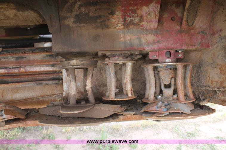 image for item H1506 2008 MacDon M200 self-propelled windrower