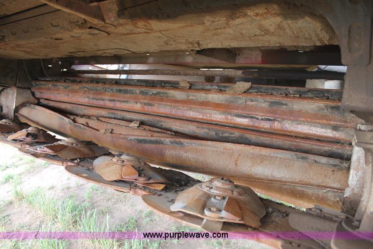 image for item H1506 2008 MacDon M200 self-propelled windrower