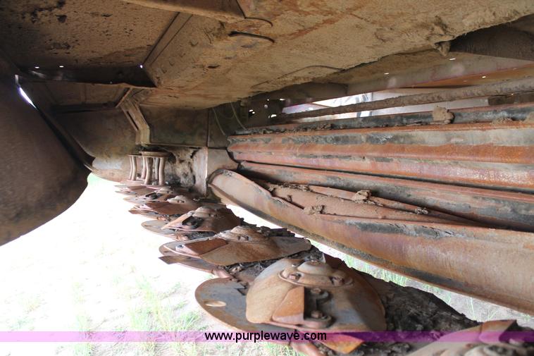 image for item H1506 2008 MacDon M200 self-propelled windrower