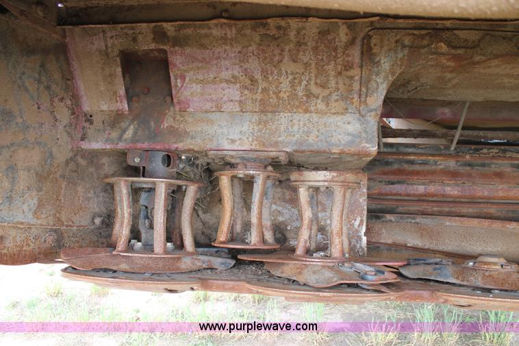 image for item H1506 2008 MacDon M200 self-propelled windrower