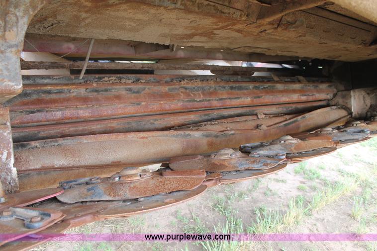 image for item H1506 2008 MacDon M200 self-propelled windrower