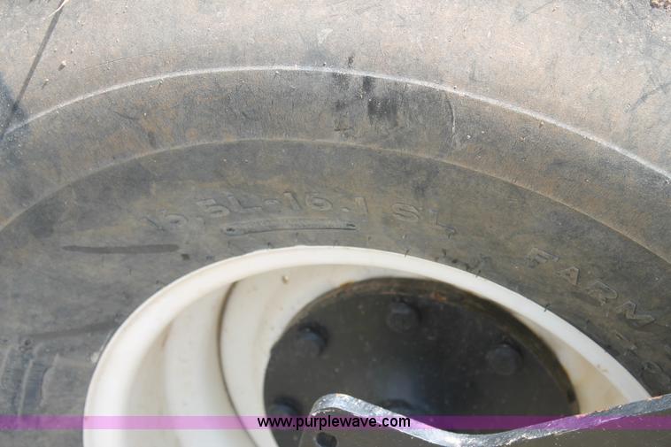 image for item H1506 2008 MacDon M200 self-propelled windrower