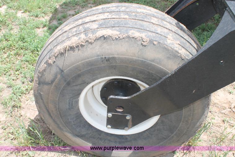 image for item H1506 2008 MacDon M200 self-propelled windrower