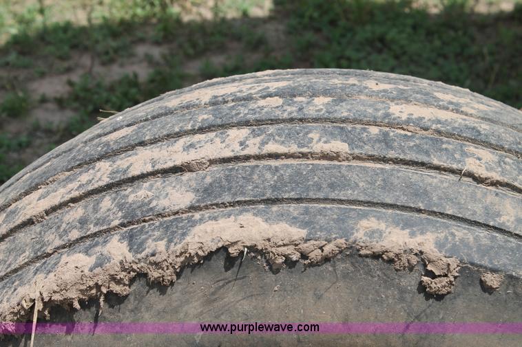 image for item H1506 2008 MacDon M200 self-propelled windrower