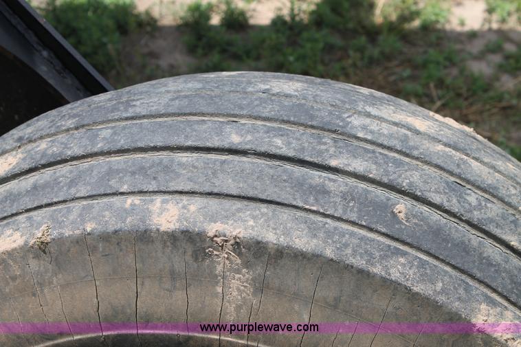 image for item H1506 2008 MacDon M200 self-propelled windrower