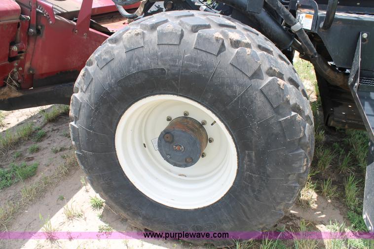 image for item H1506 2008 MacDon M200 self-propelled windrower