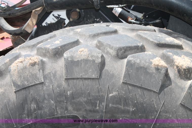 image for item H1506 2008 MacDon M200 self-propelled windrower