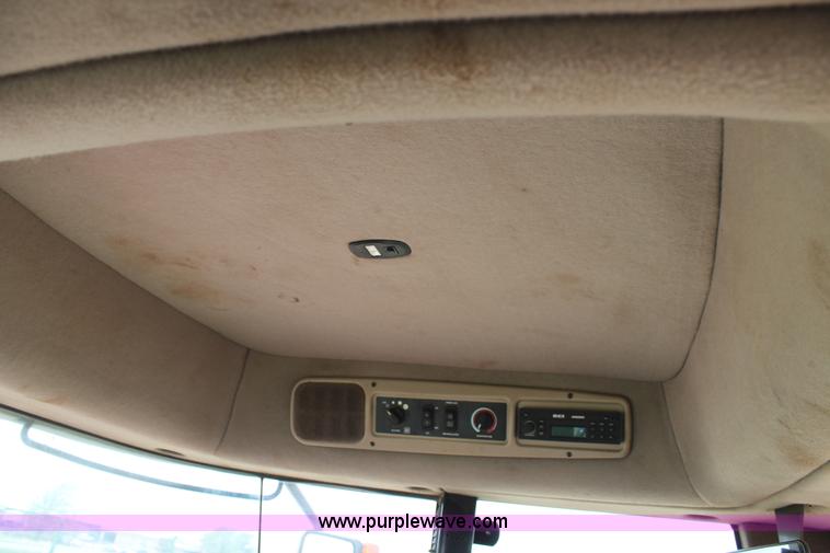 image for item H1506 2008 MacDon M200 self-propelled windrower