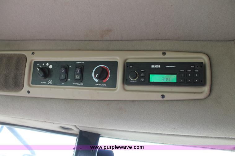 image for item H1506 2008 MacDon M200 self-propelled windrower