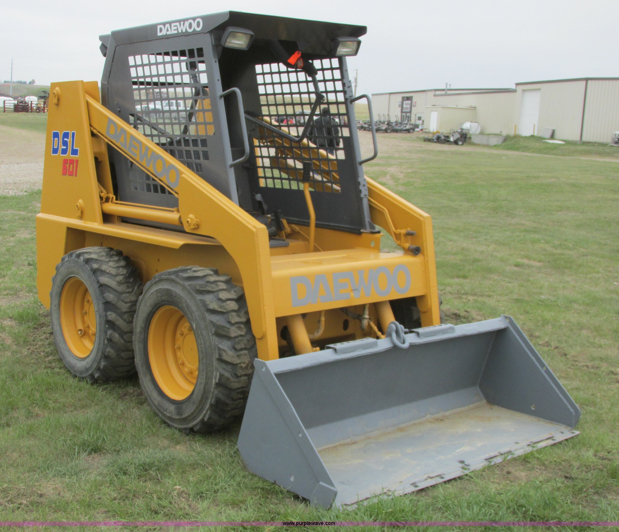 1996 Daewoo 601 skid steer in Williston, ND Item A8799 sold Purple Wave