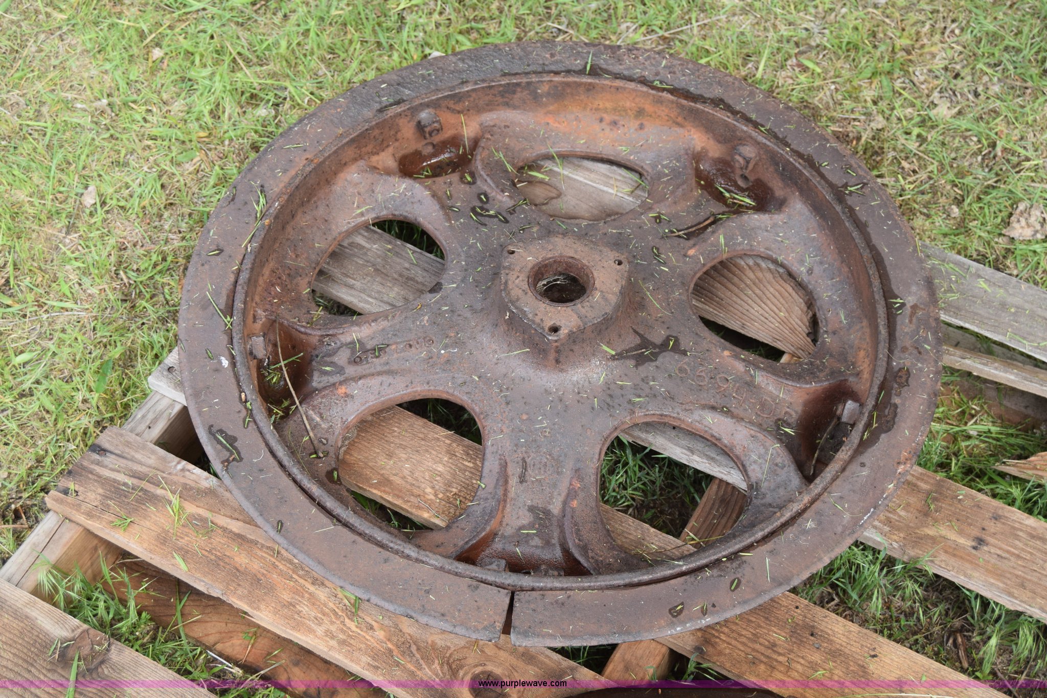 Farmall H steel wheels in Buhler, KS Item BP9171 sold Purple Wave