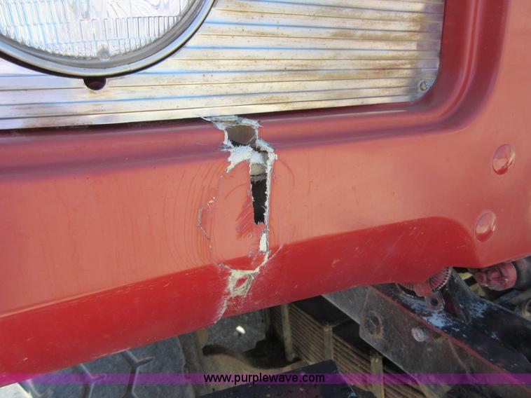 image for item D2435 1981 Mack DM6855 roll off truck