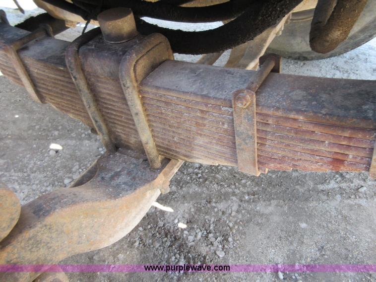 image for item D2435 1981 Mack DM6855 roll off truck