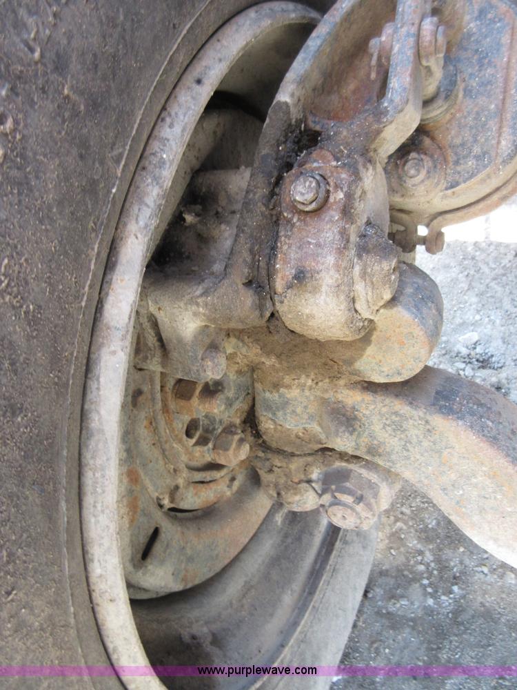 image for item D2435 1981 Mack DM6855 roll off truck