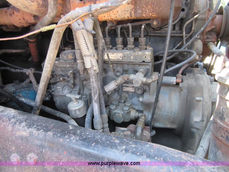 image for item D2435 1981 Mack DM6855 roll off truck