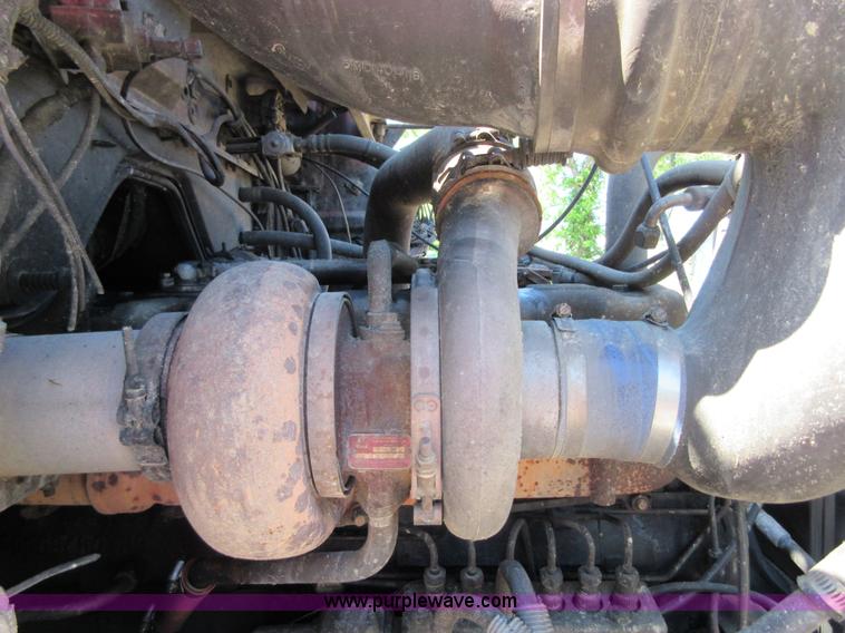 image for item D2435 1981 Mack DM6855 roll off truck