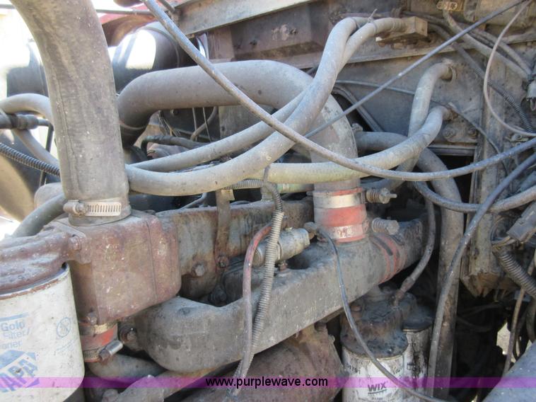 image for item D2435 1981 Mack DM6855 roll off truck