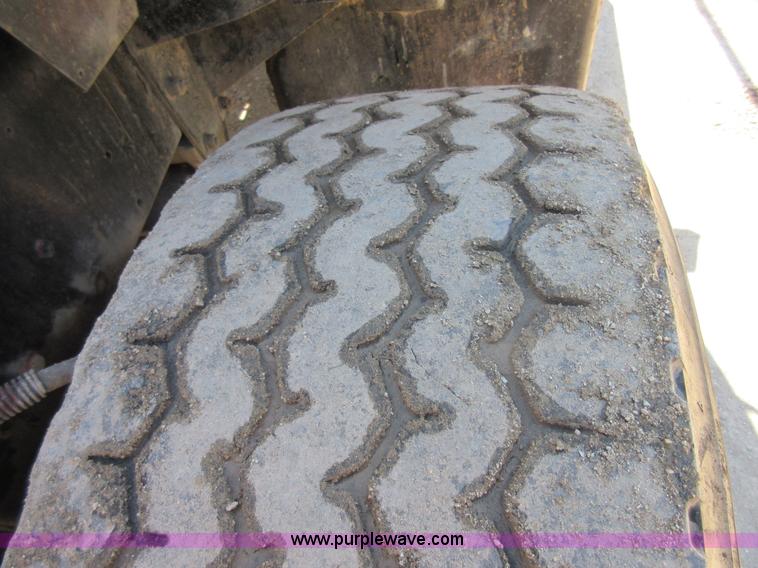 image for item D2435 1981 Mack DM6855 roll off truck