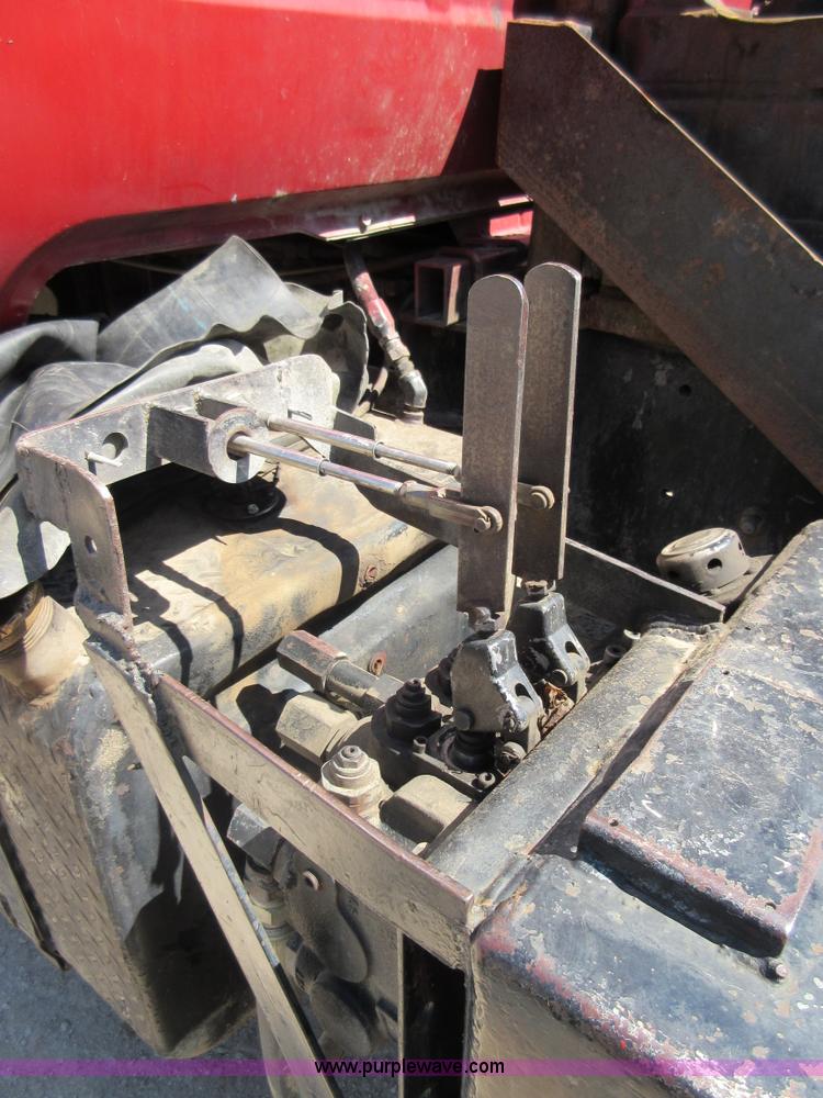 image for item D2435 1981 Mack DM6855 roll off truck