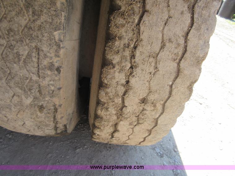 image for item D2435 1981 Mack DM6855 roll off truck