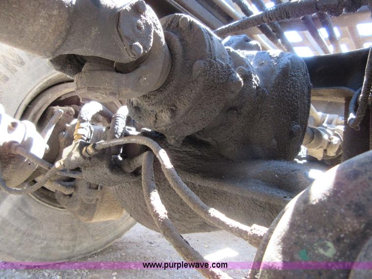 image for item D2435 1981 Mack DM6855 roll off truck