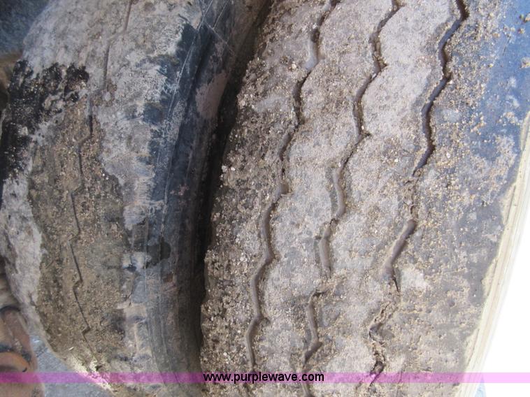 image for item D2435 1981 Mack DM6855 roll off truck