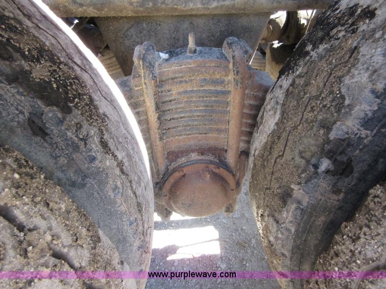 image for item D2435 1981 Mack DM6855 roll off truck