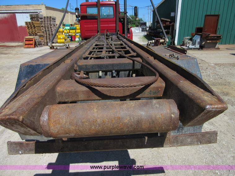 image for item D2435 1981 Mack DM6855 roll off truck