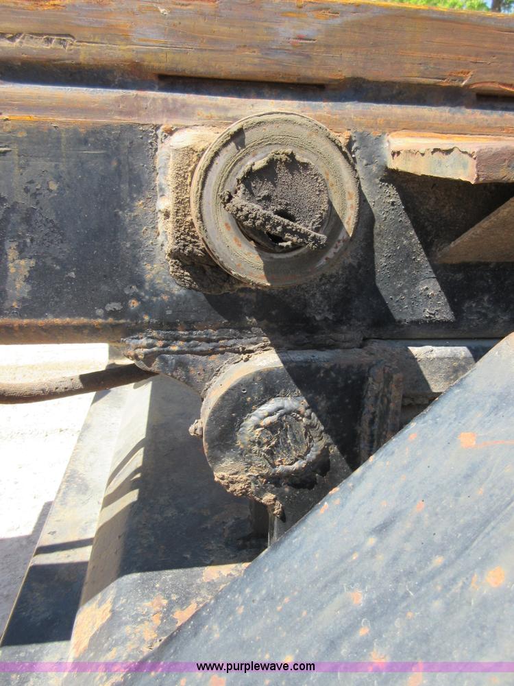 image for item D2435 1981 Mack DM6855 roll off truck