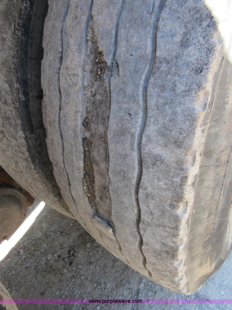 image for item D2435 1981 Mack DM6855 roll off truck