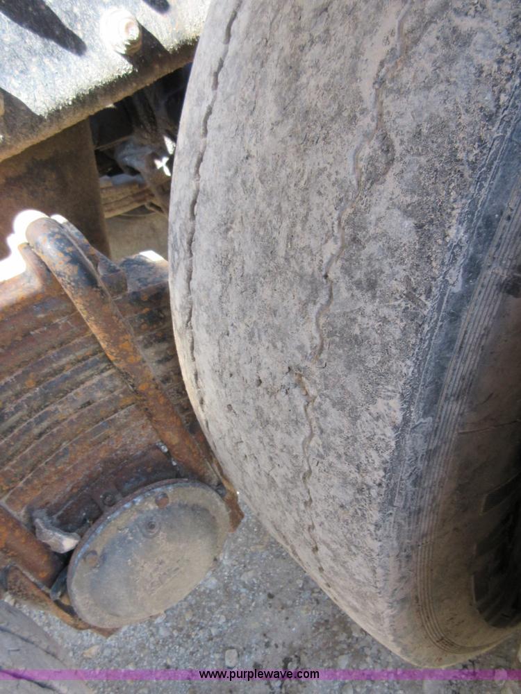 image for item D2435 1981 Mack DM6855 roll off truck