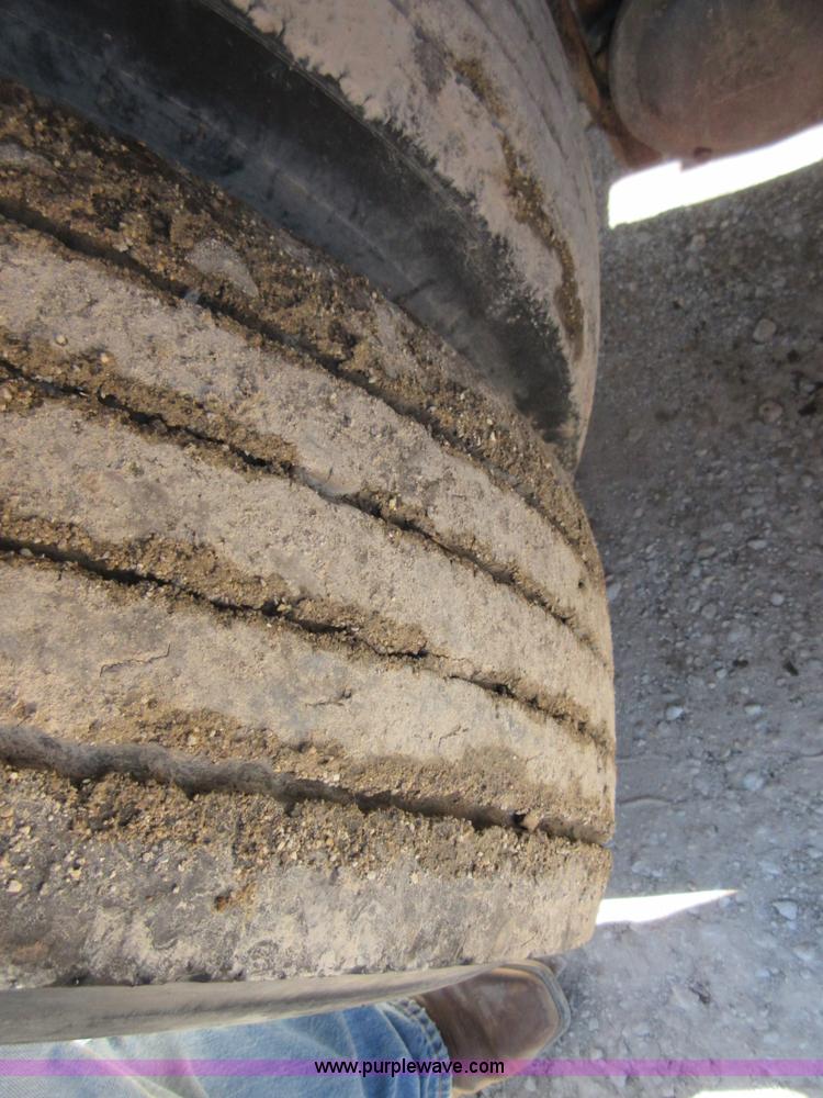 image for item D2435 1981 Mack DM6855 roll off truck