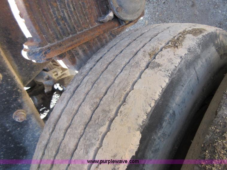 image for item D2435 1981 Mack DM6855 roll off truck