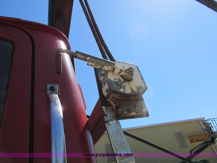 image for item D2435 1981 Mack DM6855 roll off truck