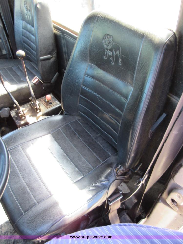 image for item D2435 1981 Mack DM6855 roll off truck