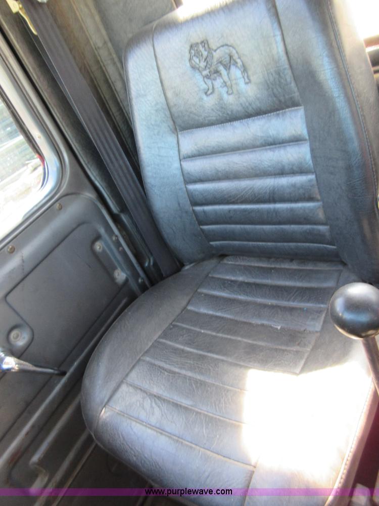 image for item D2435 1981 Mack DM6855 roll off truck