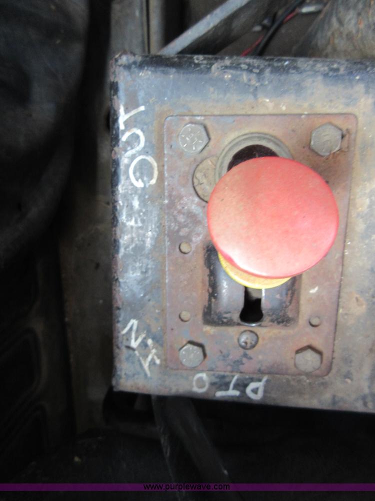 image for item D2435 1981 Mack DM6855 roll off truck