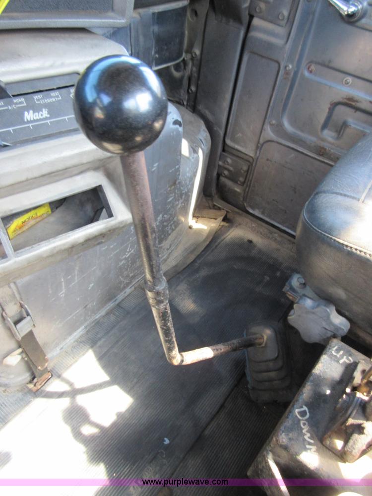 image for item D2435 1981 Mack DM6855 roll off truck