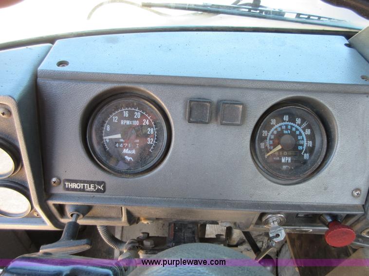 image for item D2435 1981 Mack DM6855 roll off truck