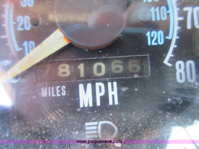 image for item D2435 1981 Mack DM6855 roll off truck